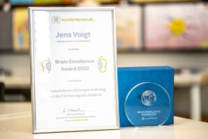 Urkunde und Award von Jens Voigt